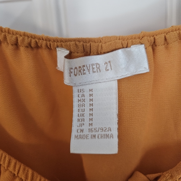 Forever21 off the shoulder top size Medium.            A - Picture 5 of 5